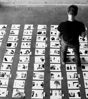 Chase laying out the image order for the Seattle 100 book.