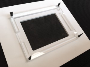 iPad holder showing the front panel overlapping the iPad bezel