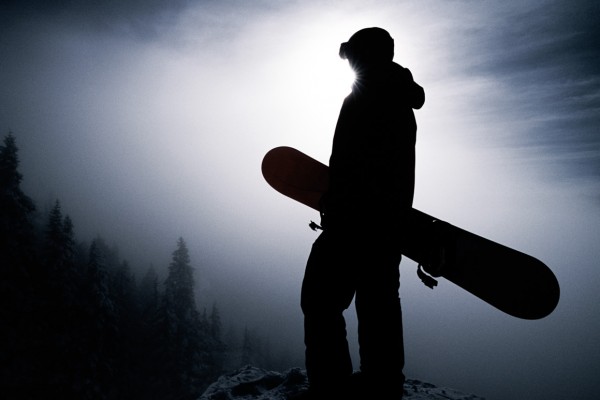 Silhouetted Snowboarder